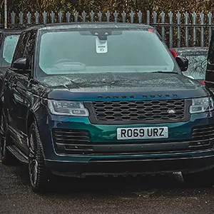side of green range rover