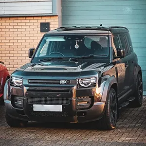 A couple of cars parked next to each other.